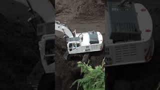 Hitachi RC Excavator and Volvo 6x6 RC Dump Truck at work - RC Mega Models 