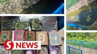 Eight questioned by KL cops over viral video of Quran found in drain