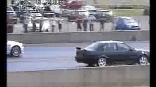 BMW M3 Vs Vauxhall Lotus Carlton Drag Race at Santa Pod