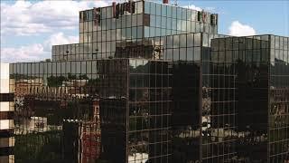 Drone Buddies - Free stock drone footage - Reflective glass office building