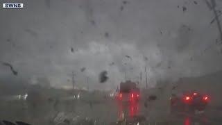 Dashcam video shows driver caught in middle of Tennessee tornado