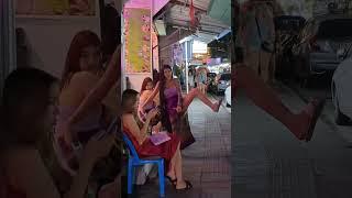 funny Massasge Girl performing on the street in Patong Thailand 2023
