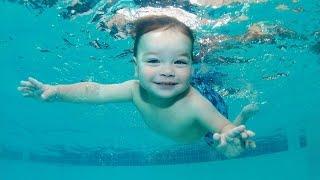 Baby Swimming In Pool