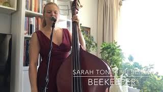 Sarah Tonin plays bass and sings and original- Beekeeper