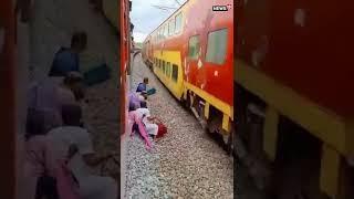Railway Track Ruckus Passengers Cross Seconds Before Trains Arrival  #Shorts  #ViralVideo