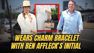 Jennifer Lopez WEARS CHARM BRACELET with Ben Afflecks initials when they are apart via divorce