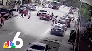 New video shows moment Miami officer is hit by car