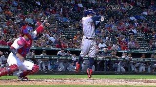 HOU@TEX Altuve jumps while swinging makes contact
