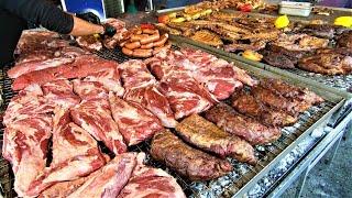 Street Food from Argentina. Huge Parillada. Asado Angus Loin Ribs Sausages