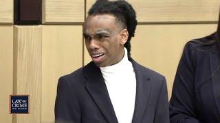 YNW Melly Appears Aggravated When Mouthing Words to Trial Observer After Court