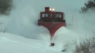 Trains Plowing Through Deep Snow Huge snow drifts vs trains