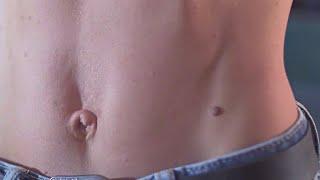 Female Fitness Model Showing her Abs Belly Button  Outie Navel Play