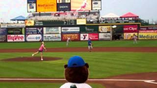 National American Miss Iowa Pre-Teen Cover Girl Jordan George throws first pitch at I-Cubs Game