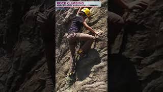 Young Girl learning Rock climbing at Himalayas India  Nehru Institute of Mountaineering