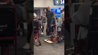 A gay Florida couple had an explosive public outburst at an airport