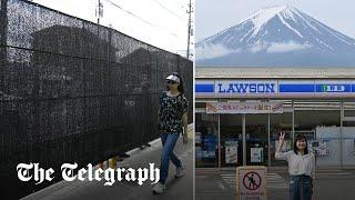 Japan puts up screen to block tourists’ view of Mount Fuji