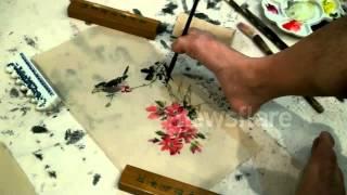 Armless man creates traditional Chinese painting with feet