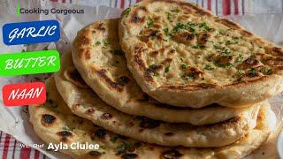 Soft and Pillowy Homemade Naan with Garlic Cilantro Butter Cooked on Tawa