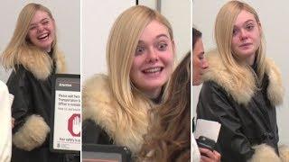 Elle Fanning Makes Funny Faces In The TSA Line At LAX