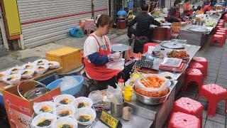 A 45-year-old chef with very fast hands A street food master  Korean street food