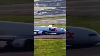 FedEx plane drags nose across runway after landing gear failure #Shorts