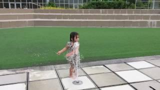 Young girl dancing in the shower