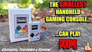 This is the THUMBY The SMALLEST Handheld Gaming Console...that can play DOOM 