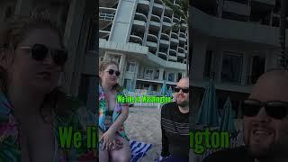 A nice couple chilling at the beach in Hawaii 