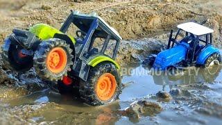 New Newholland tractor Stuck In Heavy Mud Rescue By New Tractor  tractor video  bommu kutty