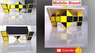 Smiggle snake puzzle or Rubiks twist 24 pieces or Snake Cube - Easy Simple Modern Mobile Stand.