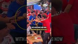Austrian fans snap baguettes in front of french fans  #euro2024 #france #austria #belgium