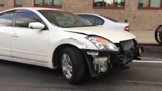 Totaled Nissan driving crazy in Queens