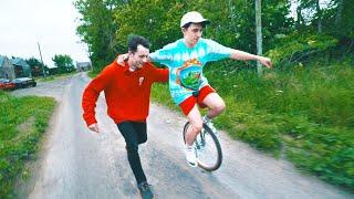 skateboarder tries to ride unicycle...