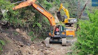 JCB Hyundai Doosan Excavators and Breakers Cut Rocky Mountain to Widen Remote Mountain Road