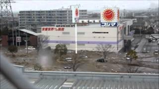 Tsunami in Tagajo Miyagi Prefecture view from the roof of the AEON department store