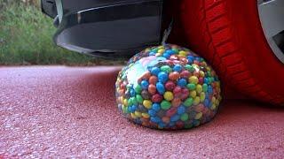 Water filled bubble Colgate Squeezkins ball Watermelon and more vs Car  CloseUp Experiment