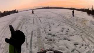 Snowboarding Behind Snowmobile