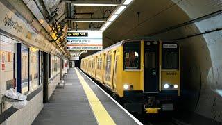 Class 313 returns on the Northern City Line to Moorgate