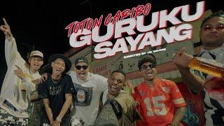 TOTON CARIBO - GURUKU SAYANG  Official Music Video