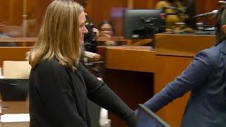 Wife of fallen Greensboro officer led out of court