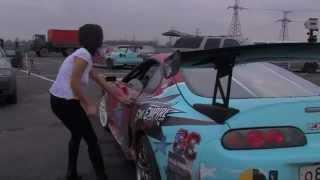 Toyota Supra Drifting unbuttons womans chest