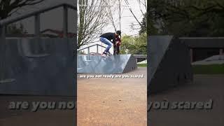 Dad encourages son on first bike ramp