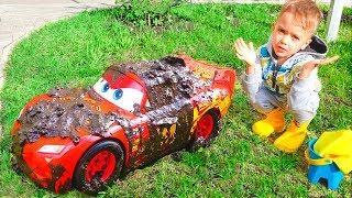 Nikita and Red Toy Car Wash