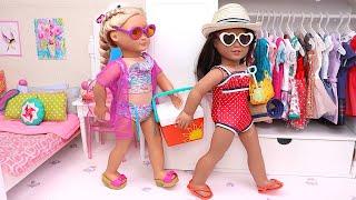 Sister dolls pack fun toys and swimwear to go to the beach PLAY DOLLS organise for family trip