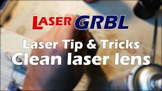 Laser engraver lens cleaning