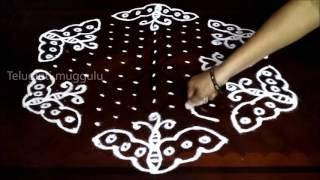 Simple butterfly kolam designs with15-8 middle  chukkala muggulu with dots rangoli design