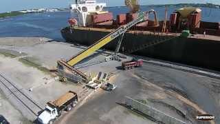 TeleStacker® Conveyor and RazerTail® Truck Unloader Loading Ships in FL