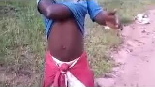 A funny talented Guy from Africa singing a song accompanied by his armpit rhythm  and fart...