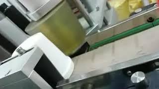 Cup labeling machine