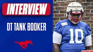 Arkansas transfer Tank Booker ready to be a centerpiece of SMU DL talks recruiting process